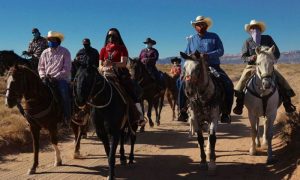 Read more about the article A young Navajo woman inspires her community to head to polls on horseback: ‘Our ancestors fought for this right’