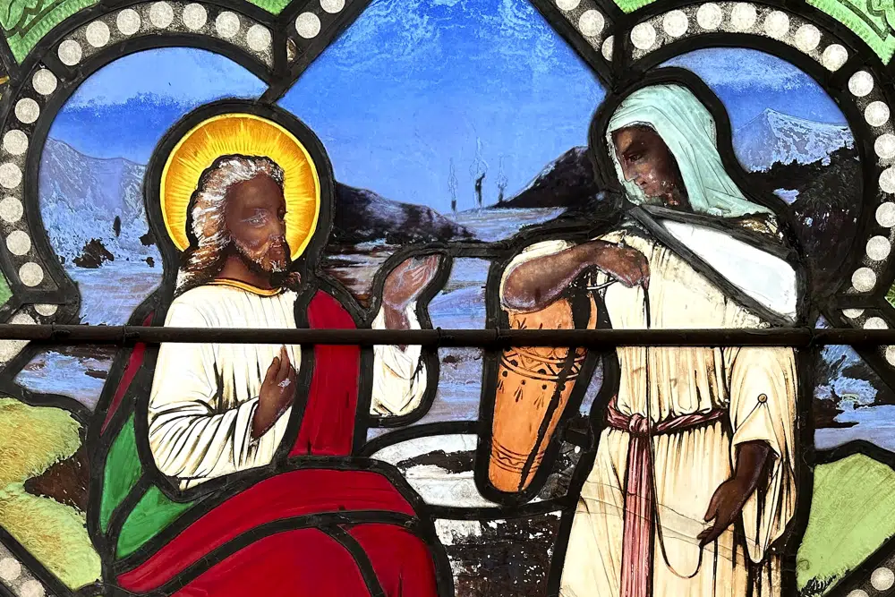 You are currently viewing Stained glass window shows Jesus Christ with dark skin, stirring questions about race in New England