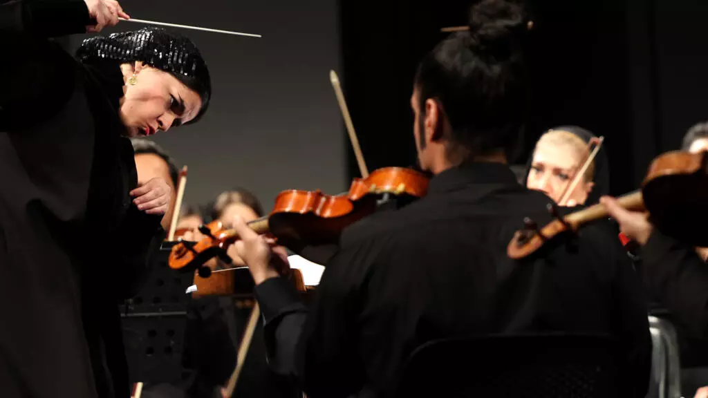 You are currently viewing The Bright Side: Iran’s first woman orchestra conductor draws delighted crowds